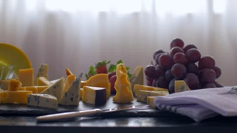 Romantic lunch with different types of cheese. 動画素材 109128231