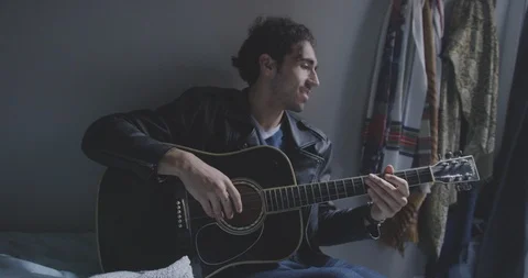 Romantic Man Plays Guitar Stock Footage 94411058