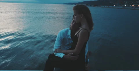 Romantic moment between a couple hugging each other at sunset Stock Footage 204916288