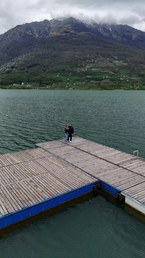 Romantic Moment by the Water Drone Pull Back Stock Footage 301452791