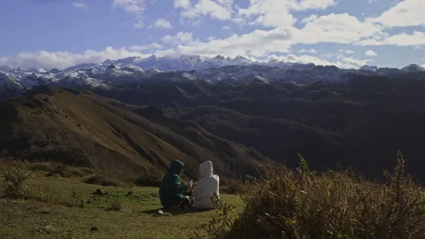Romantic mountain picnic overlooking snowy peaks in Spain. Stock Footage 337651449
