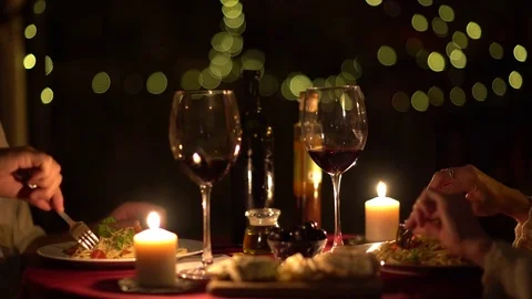 Romantic Night Dinner Man and Woman Red Wine Candles Stock Footage 78477590