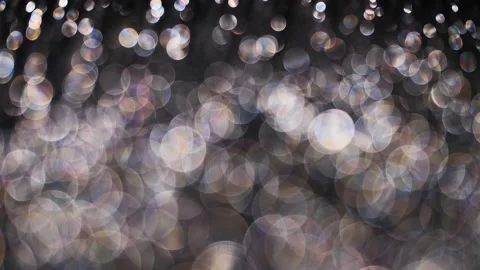 Romantic pearl or silver colored bokeh background. Abstract light overlay. Stock Footage 146216159