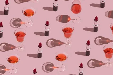Romantic pink pattern made of party cocktail glasses and red lipstick on past Stock Photos