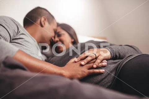 Romantic pregnant couple waiting for a child Stock-Fotos