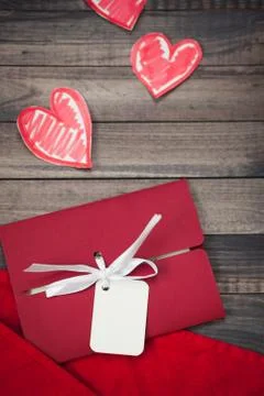 Romantic red envelope on a wooden background Valentine's Day heart-shaped Stock Photos
