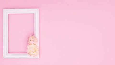 Romantic roses appear in white frame for text on left side. Stop motion Stock Footage 137857408