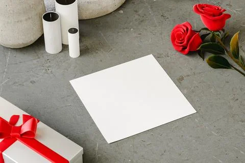 Romantic scene of a blank postcard with rouses and gifts. 3d render 스톡 일러스트