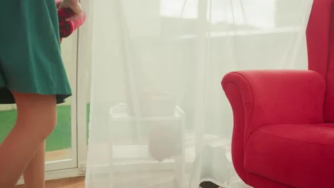 Romantic scene of two lovers exchanging cozy festive coverings indoors Video stock 325217292