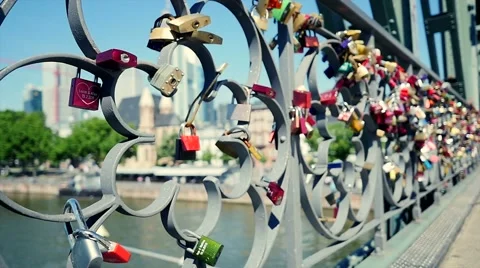 Romantic scenery of locks mounted on bridge wall symbolizing togetherness   Stock Footage 40465650