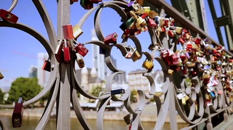 Romantic scenery of locks mounted on bridge wall symbolizing togetherness   Stock-Footage 40466948