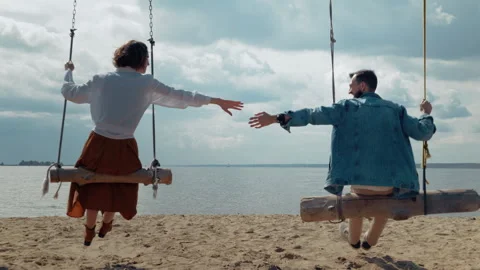 Romantic Seaside Swing with Ocean View Stock Footage 328560751