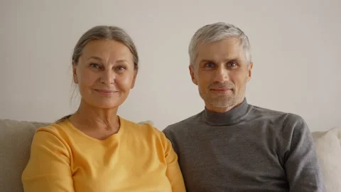 Romantic senior couple smiling at camera Stock Footage 133525702