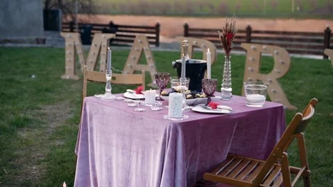 The romantic setting, from the green meadow, under the rustic background of the Stock Footage 155385010