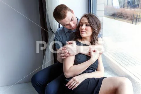 Romantic sexy couple in love having nice time together. Young woman hugging  b Stock Photo #104264360