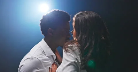 Romantic shot of couple dancing, expressing love, beautiful woman touches dark Stock Footage 157061845