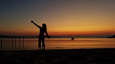 Romantic Silhouette Couple Slow Dancing on Sunset Beach Video stock 335522666