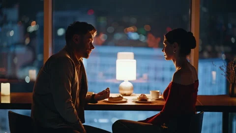 Romantic spouses talking night cafeteria blurred view. Romantic couple dinner Stock Footage 340110398