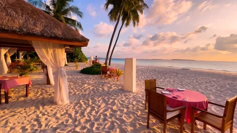 Romantic sunset dinner on the beach. Summer love, romance date on vacation Stock Footage 239005723