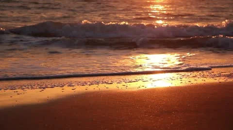 Romantic sunset over sandy beach Stock Footage