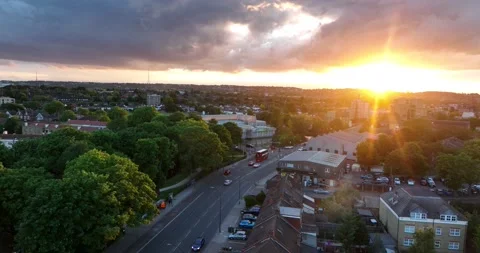 Romantic sunset over town, streets and buildings in residential neighbourhood Stock Footage 201883150