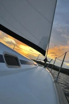 Romantic sunset on the sailboat Stock Photos