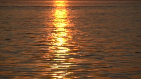 Romantic Sunset at the sea. Sun going down over horizon. Beautiful sunset Stock Footage 101842462