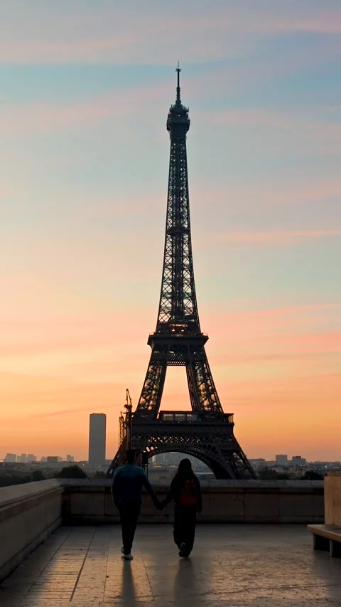 Romantic sunset stroll by the Eiffel Tower in Paris, France Video stock 347997714