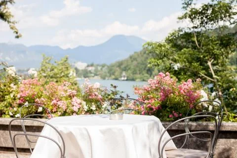 Romantic table on beatiful terrace Stock Photos