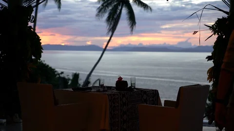 Romantic table set for two with ocean view 库存影片 127807212