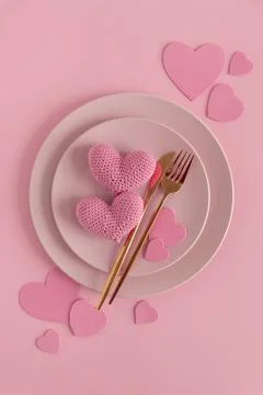 Romantic Table Setting with Knitted Hearts. Valentines Day Flatlay on Pink .. Stock Photos
