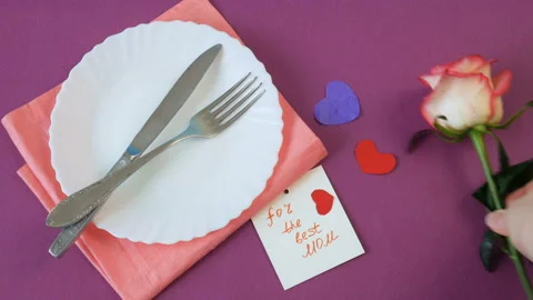 Romantic table setting with roses Stock Footage 104722890