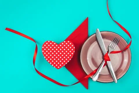 Romantic table setting for Valentines day or dinner date celebration wedding. Stock Photos