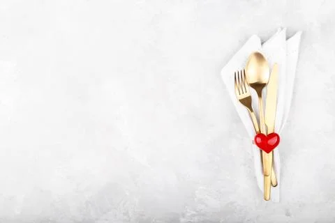 Romantic table setting on white stone table. Valentine's day card template Stock Photos