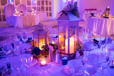 Romantic table setup for special event with candles indoor Stock Photos