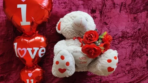 Romantic Teddy Bear holding a heart Stock Footage 328275633