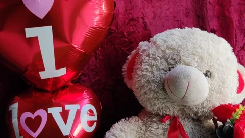 Romantic Teddy Bear holding a heart Stock Footage 328275635