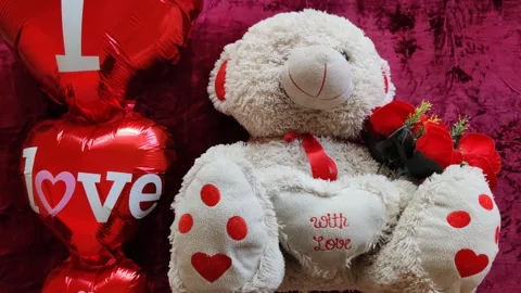 Romantic Teddy Bear holding a heart Stock Footage 328275639