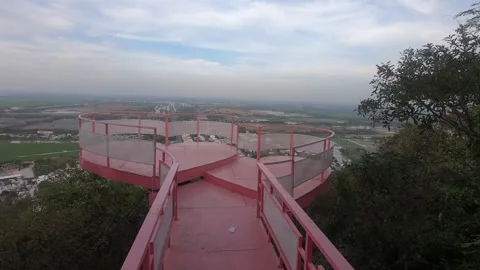 A romantic viewpoint, 2 pink hearts. POV walking. Green fields view Stock Footage 234128316