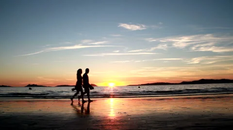 Romantic walk in the beach Stock Footage 51990628
