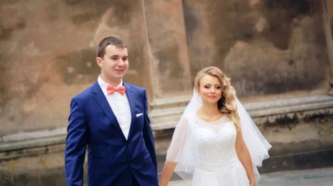 Romantic Wedding Concept Bride Holding Hand Walking shot in slow motion  close Stock Footage 57454992