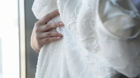 Romantic Wedding Concept Bride Holding wedding dress Stock Footage 70914294