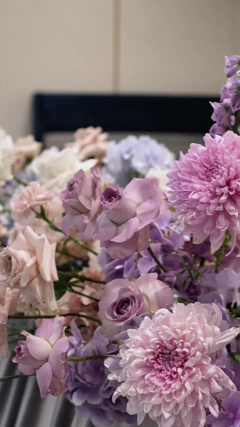 Romantic wedding flower arrangement for table decoration. Purple and pink colors Video stock 319046062