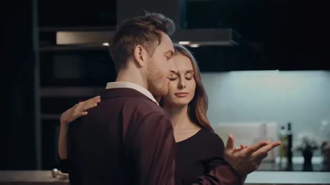 Romantic young couple dancing at home. Romantic young couple meet at home. Stock Footage 219636580