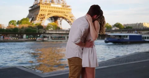 Romantic young couple dancing by the Seine Stock Footage 85781353