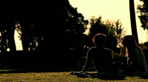 Romantic young couple in a park Stock Footage 11174602