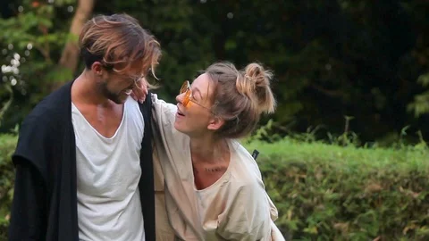 Romantic young couple is spending time with each other outdoor. Video stock 85526361