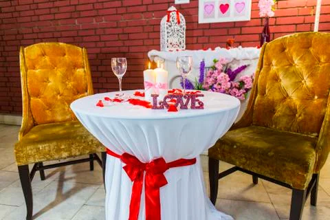 Romantic zone with round table Stock Photos