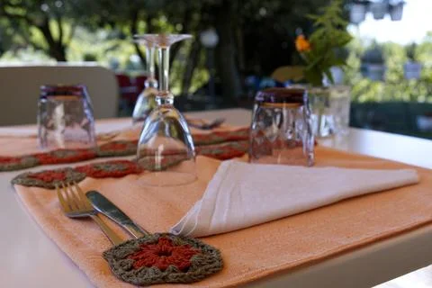 Romantically set table for two on the garden patio Stock Photos