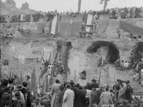 Rome - 1944: Crowd with pro-communist flags at rally Stock Footage 219451712
